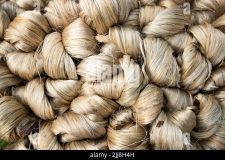 Spesso bruno fascio di fibra di iuta grezza trama sfondo Foto Stock