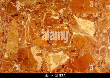 Sfondo di macchie geometrie e irregolari di diverse dimensioni in tonalità di marrone e rosso. Foto Stock