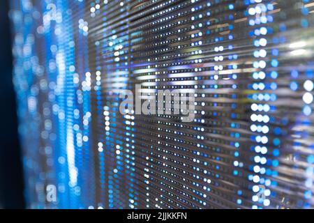 A motion blurred flash light of data and information transfer concept created with LED lights board Stock Photo