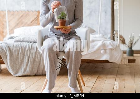 uomo a cupola aperta serra concettuale pianta Foto Stock