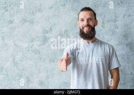 lifestyle di volontariato pensa la mano di aiuto differente Foto Stock