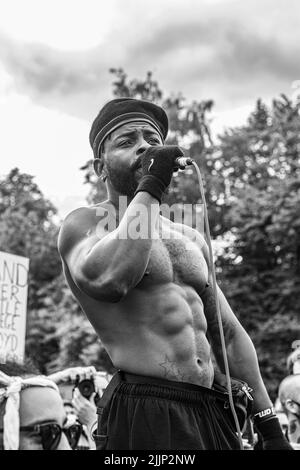 Un colpo in scala di grigi della protesta della materia di vite nere, Glasgow verde. REGNO UNITO Foto Stock