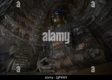 Le statue di Buddha nelle grotte di Yungang, Datong City, provincia di Shanxi, Cina Foto Stock