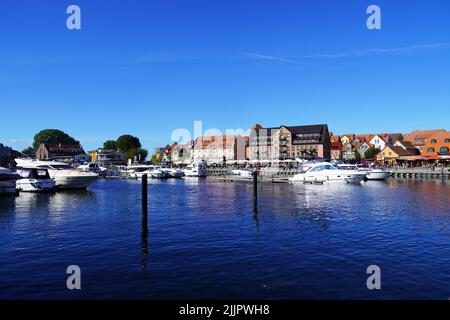 A view of the town of Waren on the shore of Mueritz with its harbour in daylight, Germany Stock Photo