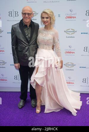 John Caudwell e Modesta Vzesniauskaitel al Caudwell Children Butterfly Ball a Grosvenor House, Park Lane, Londra Foto Stock