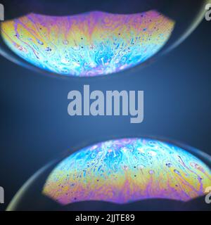 Grafica beautiful soap bubbles animation animated background. Bolle di sapone astratte con riflessi colorati. Bolle di sapone sullo sfondo del movimento. Foto Stock