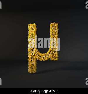 Lettera gialla sparsa isolata su sfondo nero Foto Stock