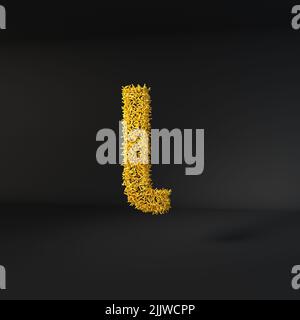 Lettera gialla sparsa isolata su sfondo nero Foto Stock