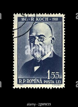 Robert Koch (1843-1910), ricercatore della tubercolosi, esploratore, scopritore del bacillo tubercolare, circa 1960. Timbro postale vintage isolato su sfondo nero Foto Stock