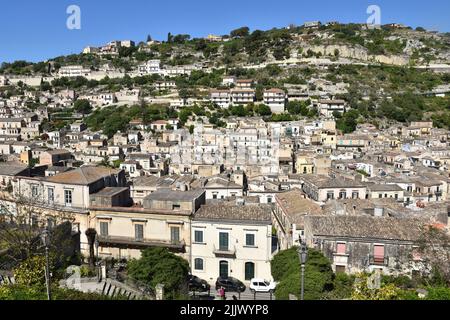 Beautiful view of residential area of Modica, Sicily in Italy, with old houses built on the hillside. Sicilian heritage and tourist attractions Stock Photo