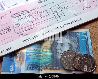 Assegni NatWest, pagamento in polizze, storia bancaria - denaro scozzese / banconote Foto Stock