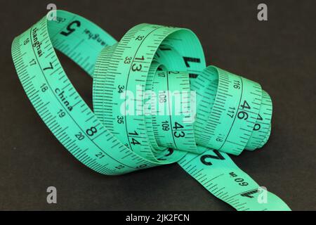Metro a nastro Green Tailor in centimetri e pollici Foto Stock