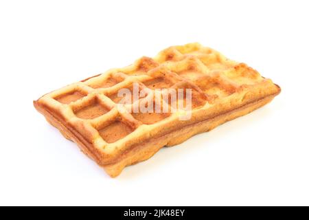 Il waffle è corrugato. Pronto, dolce, fritto in un dessert a base di waffle. Deliziosa colazione per il tè al mattino Foto Stock