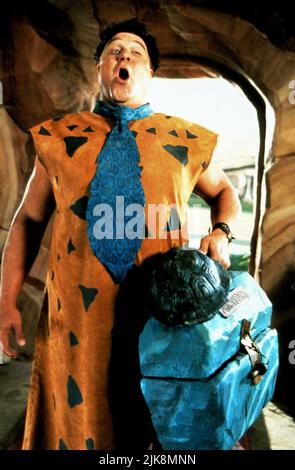 John Goodman Film: The Flintstones (USA 1994) personaggi: Fred Flintstone regista: Brian Levant 23 maggio 1994 **AVVISO** questa foto è solo per uso editoriale ed è copyright di HANNA-BARBERAUNIVERSAL e/o del fotografo assegnato dalla Film o dalla Società di produzione e può essere riprodotta solo da pubblicazioni in concomitanza con la promozione del suddetto Film. È richiesto un credito obbligatorio a HANNA-BARBERAUNIVERSAL. Il fotografo deve essere accreditato anche quando è noto. Nessun uso commerciale può essere concesso senza l'autorizzazione scritta della Film Company. Foto Stock