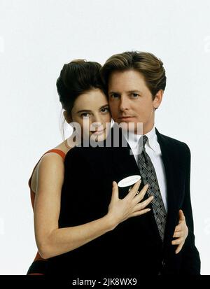 Gabrielle Anwar & Michael J. Fox Film: Per amore o denaro; il Concierge (USA 1993) personaggi: Andy Hart & Director: Barry Sonnenfeld 01 ottobre 1993 **AVVISO** questa fotografia è solo ad uso editoriale ed è copyright DI UNIVERSAL e/o del fotografo assegnato dalla Film o dalla Società di produzione e può essere riprodotta solo da pubblicazioni in concomitanza con la promozione del suddetto Film. È richiesto un credito obbligatorio per UNIVERSAL. Il fotografo deve essere accreditato anche quando è noto. Nessun uso commerciale può essere concesso senza l'autorizzazione scritta della Film Company. Foto Stock