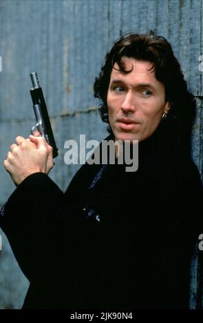 Thomas Ian Griffith Film: Eccessive forze (1993) personaggi: Terry McCain regista: David Jackson 14 Maggio 1993 **ATTENZIONE** questa fotografia è solo ad uso editoriale ed è copyright di NEW LINE CINEMA e/o del fotografo assegnato dalla Film o dalla Società di produzione e può essere riprodotta solo da pubblicazioni in concomitanza con la promozione del suddetto Film. È richiesto un credito obbligatorio per IL CINEMA DI NUOVA LINEA. Il fotografo deve essere accreditato anche quando è noto. Nessun uso commerciale può essere concesso senza l'autorizzazione scritta della Film Company. Foto Stock