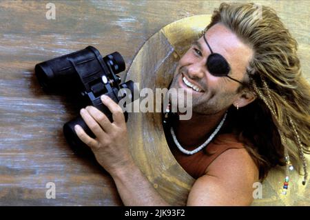 Kurt Russell Film: Captain Ron (1990) personaggi: Captain Ron Eye Patch Director: Thom Eberhardt 25 Settembre 1992 **ATTENZIONE** questa fotografia è solo per uso editoriale ed è copyright di TOUCHSTONE e/o del fotografo assegnato dalla Film o dalla Società di produzione e può essere riprodotta solo da pubblicazioni in concomitanza con la promozione del suddetto Film. È richiesto un credito obbligatorio per TOUCHSTONE. Il fotografo deve essere accreditato anche quando è noto. Nessun uso commerciale può essere concesso senza l'autorizzazione scritta della Film Company. Foto Stock