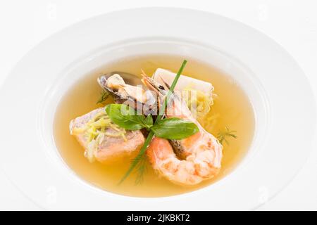 ricetta per zuppa di pesce piatto di crostacei assortiti Foto Stock
