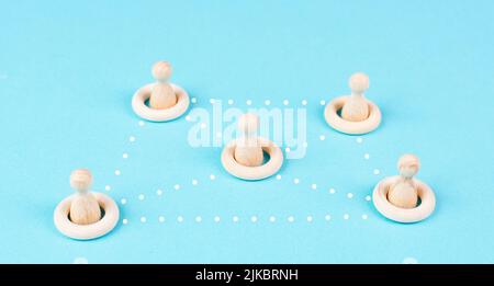 Group of people connecting through a web, business networking, communication and teamwork Foto Stock