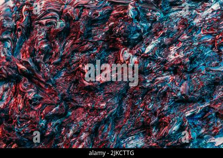 astratto arte blu maroon bagnato vernice roccia texture Foto Stock