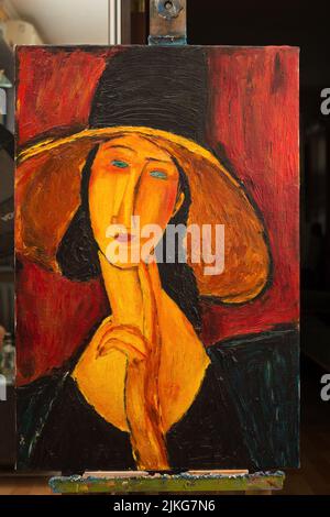 Bella immagine olio su tela. Ritratto di una donna in un cappello. Copia gratuita basata sul famoso dipinto di Amedeo Modigliani. Foto Stock