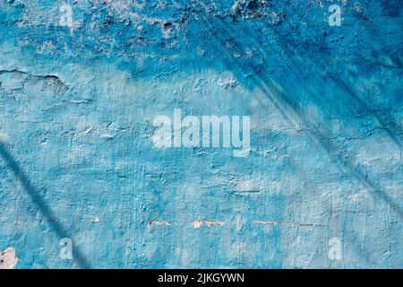 Immagine verticale di una superficie di parete blu per gli sfondi Foto Stock