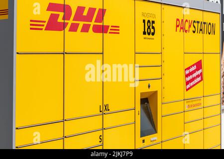 Stazione di imballaggio della società DHL Foto Stock