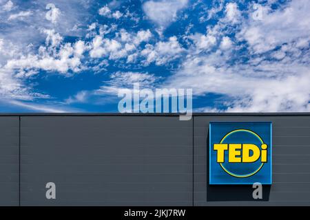 Pubblicità e firma aziendale della società Tedi Foto Stock