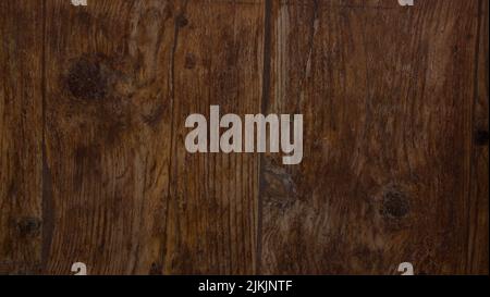 Un primo piano di una texture di pannelli di legno marrone Foto Stock