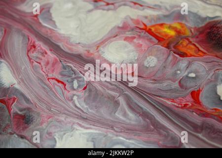 Uno sfondo colorato astratto in marmo acrilico a trama liquida Foto Stock