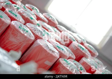 Lavoratori dei prodotti tessili per il controllo delle palazzaie Foto Stock