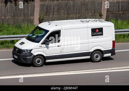 Loomis Volkswagen Crafter furgone di sicurezza in autostrada Foto Stock