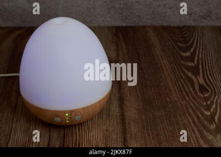 Un primo piano di diffusore elettrico aromatico Foto Stock