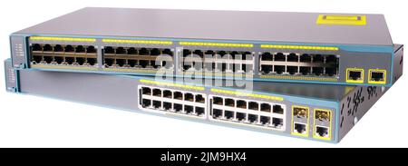 Due switch di rete Fast ethernet isolati sul bianco Foto Stock