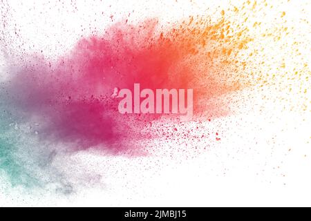 Esplosione di polvere multicolore su sfondo bianco.Abstract colorata polvere particelle texture sfondo Foto Stock