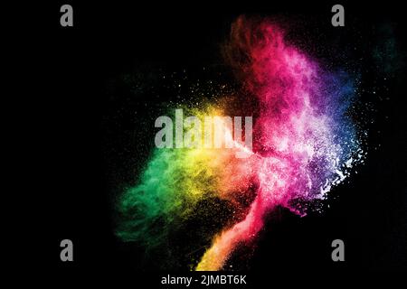 Esplosione di polvere colorata astratta su sfondo nero. Foto Stock