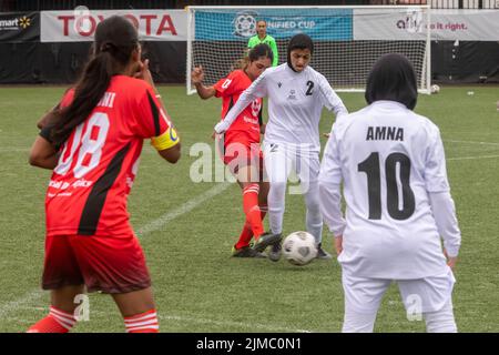Detroit, Michigan - le squadre femminili degli Emirati Arabi Uniti e dello Sri Lanka si incontrano nel torneo di calcio Special Olympics Unified Cup (calcio). Foto Stock