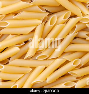 Penne lisce maccheroni - pasta italiana sfondo Foto Stock