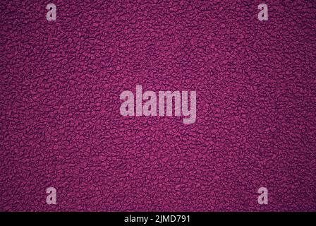 Fondo scuro con texture magenta intenso Foto Stock