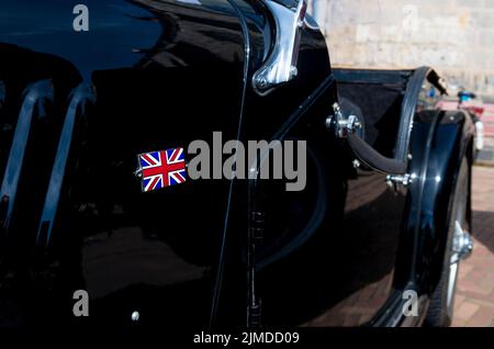 Oldtimer con bandiera brittish Foto Stock