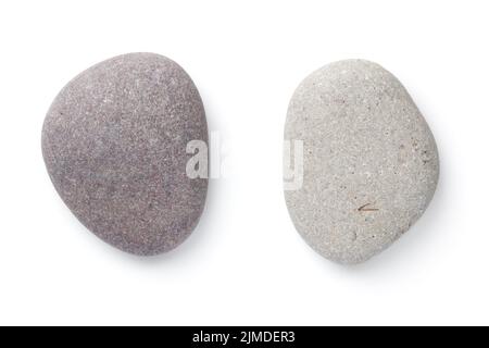 Pietre di Pebble grigie isolate su sfondo bianco Foto Stock