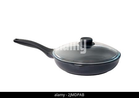 Nuova padella vuota nera con coperchio in vetro isolato su bianco Foto Stock