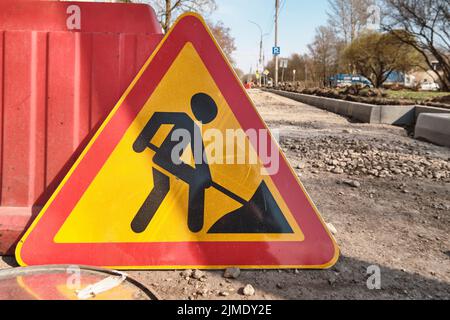 Segnale stradale di avvertimento: Lavori stradali in corso Foto Stock