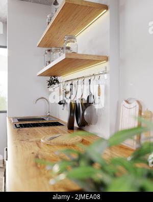 Piano cucina in legno con piano cottura e lavello, ripiani con utensili da cucina su parete bianca vicino alla finestra, elegante cucina interna Foto Stock