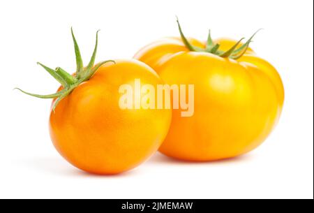 Pomodori gialli isolati su sfondo bianco Foto Stock