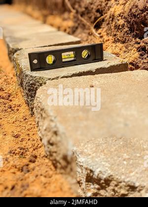 Costruzione di una nuova base a parete di fissaggio Foto Stock
