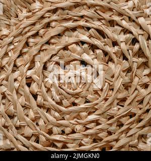 Modello circolare di cesto di erba di mare intrecciato Foto Stock