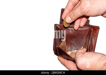 Un portafoglio vuoto nelle mani di un giovane Foto Stock