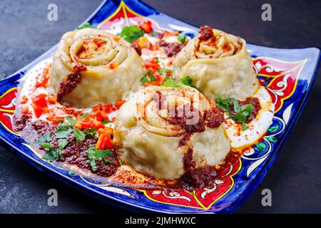 Tradizionale afghano Ay khanom al vapore con mincemeat Foto Stock