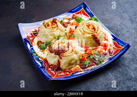 Tradizionale afghano Ay khanom al vapore con mincemeat Foto Stock